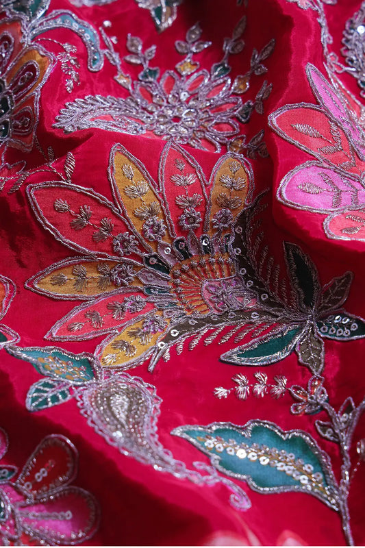 AIzaSyBcstauz-XMPRhEY21AUzeo032pxrXB5Ug - Heavy Gold Zari With Sequins Floral Embroidery On Dark Rani Crepe Fabric