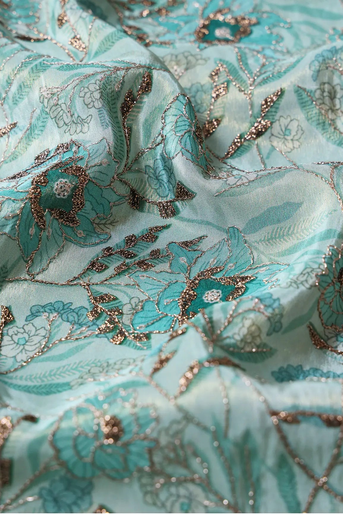 AIzaSyBcstauz-XMPRhEY21AUzeo032pxrXB5Ug - Floral Position Print On Gold Zari With Sequins Embroidery Teal Viscose Zari Tissue Fabric