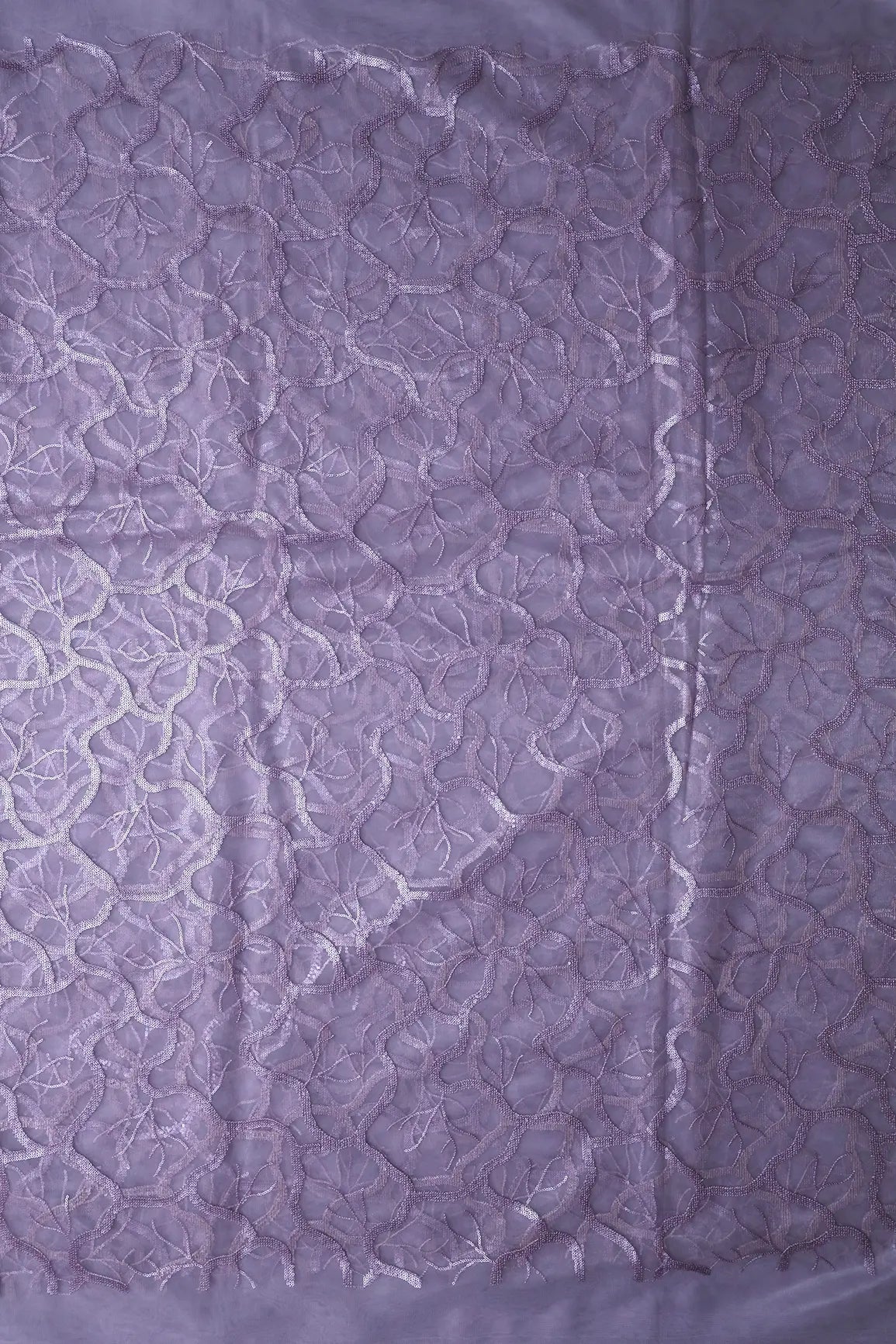 AIzaSyBcstauz-XMPRhEY21AUzeo032pxrXB5Ug - Light Lilac Sequins Abstract Embroidery On Lilac Soft Net Fabric