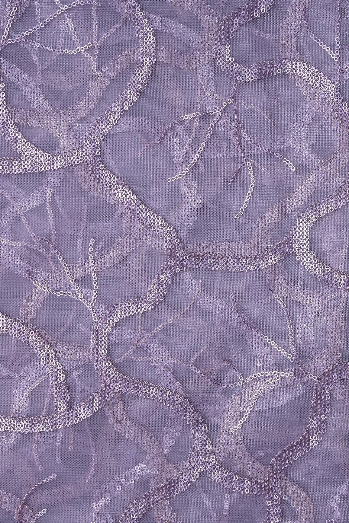AIzaSyBcstauz-XMPRhEY21AUzeo032pxrXB5Ug - Light Lilac Sequins Abstract Embroidery On Lilac Soft Net Fabric