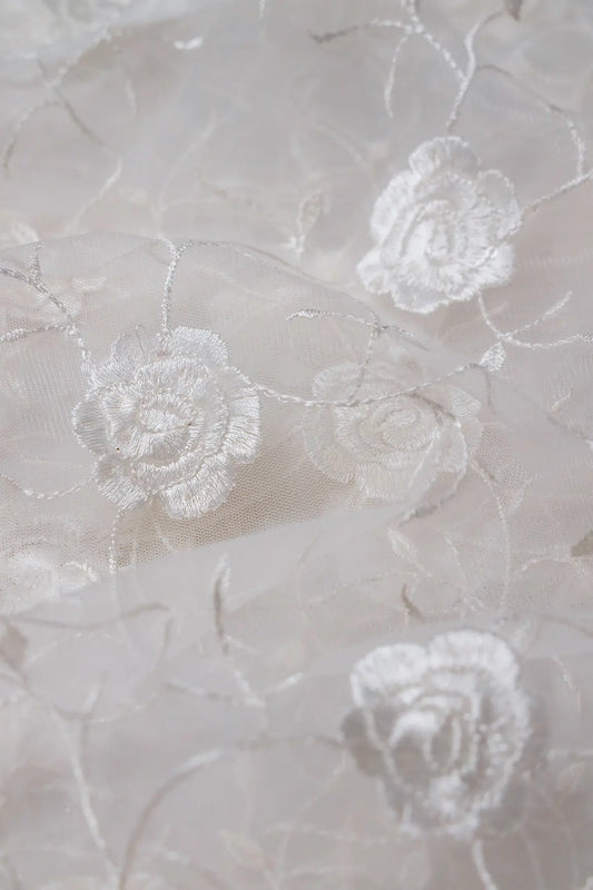 Water Sequins With White Thread Floral Embroidery On White Dyeable Soft Net Fabric
