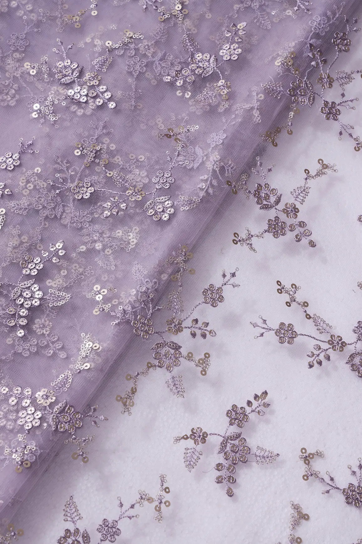 AIzaSyBcstauz-XMPRhEY21AUzeo032pxrXB5Ug - Gold Sequins With Thread Work Floral Embroidery On Lilac Soft Net Fabric