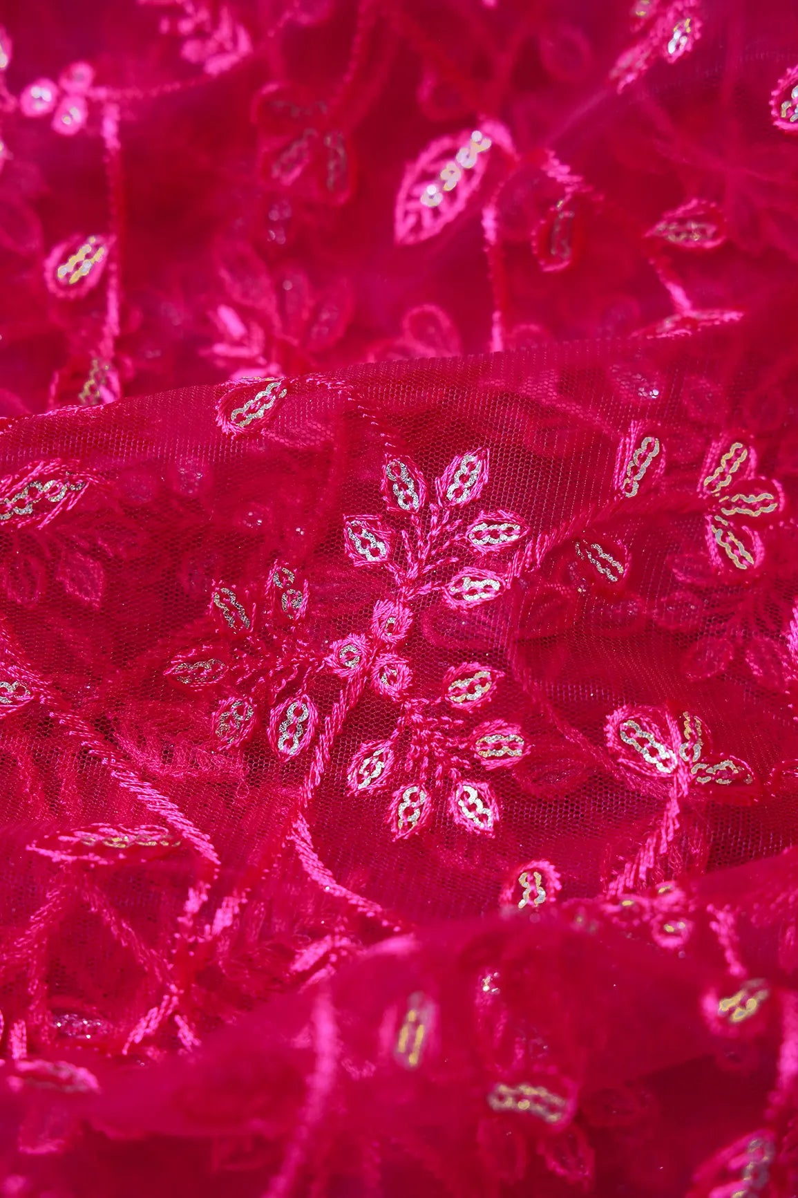 AIzaSyBcstauz-XMPRhEY21AUzeo032pxrXB5Ug - Beautiful Gold Glitter Sequins Heavy Floral Embroidery On Fuchsia Soft Net Fabric