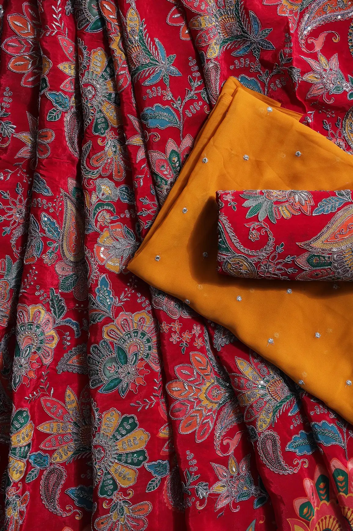 AIzaSyBcstauz-XMPRhEY21AUzeo032pxrXB5Ug - Heavy Gold Zari With Sequins Floral Embroidery On Red Crepe Fabric Unstitched Lehenga Set Fabric (3 Piece)