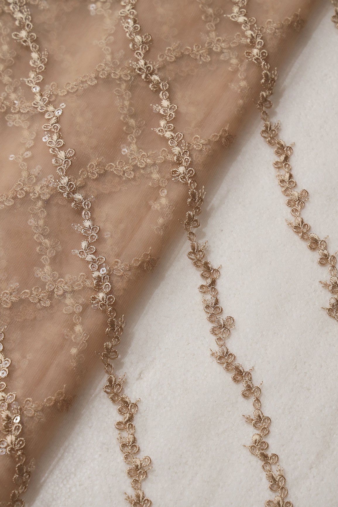 AIzaSyBcstauz-XMPRhEY21AUzeo032pxrXB5Ug - Beige Thread With Sequins Strip Embroidery Work On Beige Soft Net Fabric