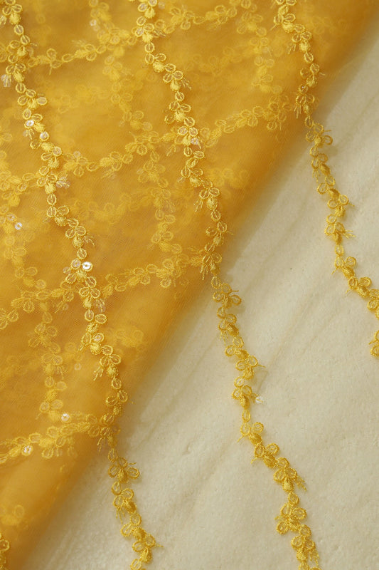 Yellow Thread With Sequins Strip Embroidery Work On Yellow Soft Net Fabric