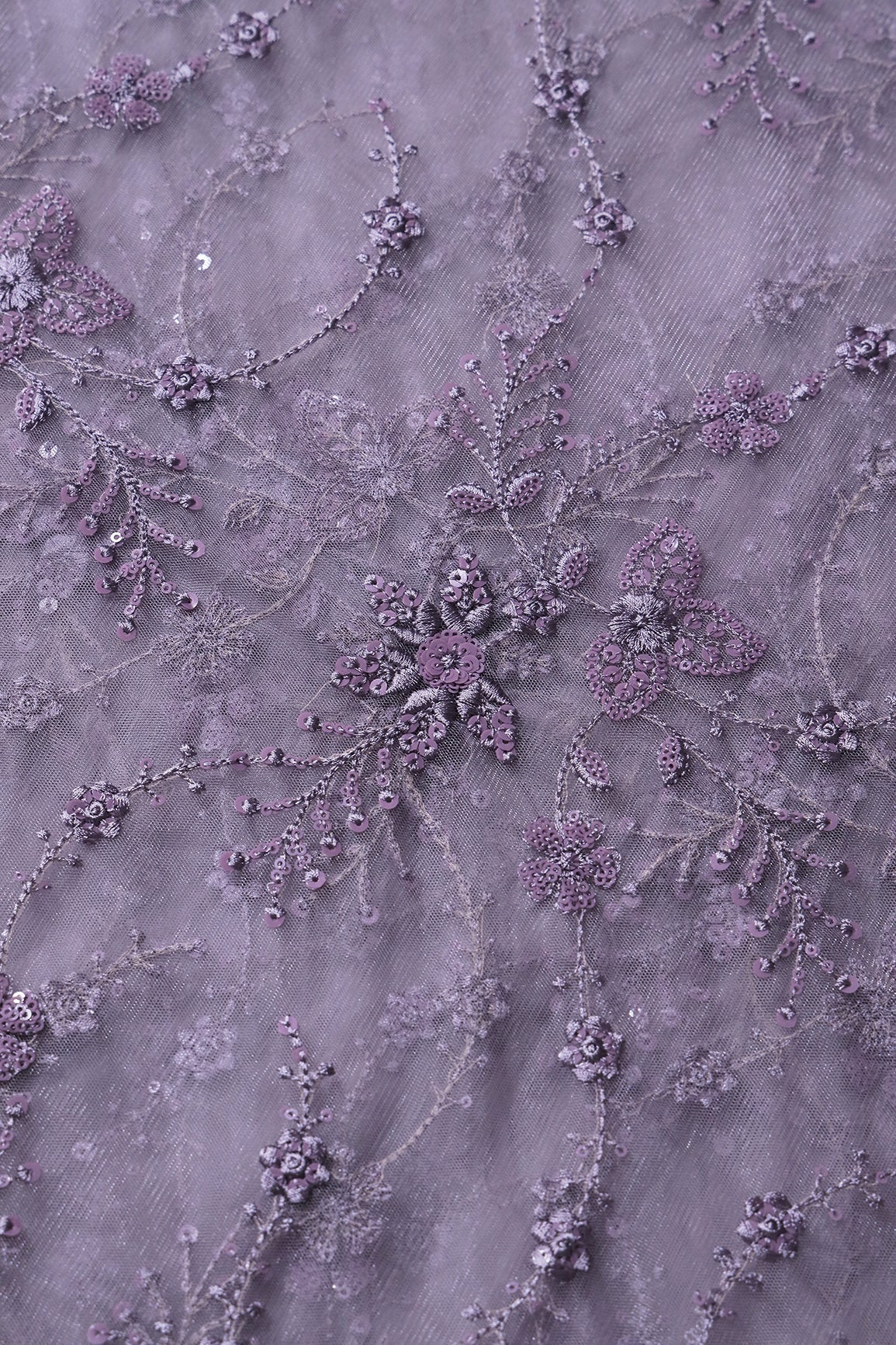 AIzaSyBcstauz-XMPRhEY21AUzeo032pxrXB5Ug - Beautiful Grey Thread With Sequins Floral Embroidery Work On Purple Grey Soft Net Fabric