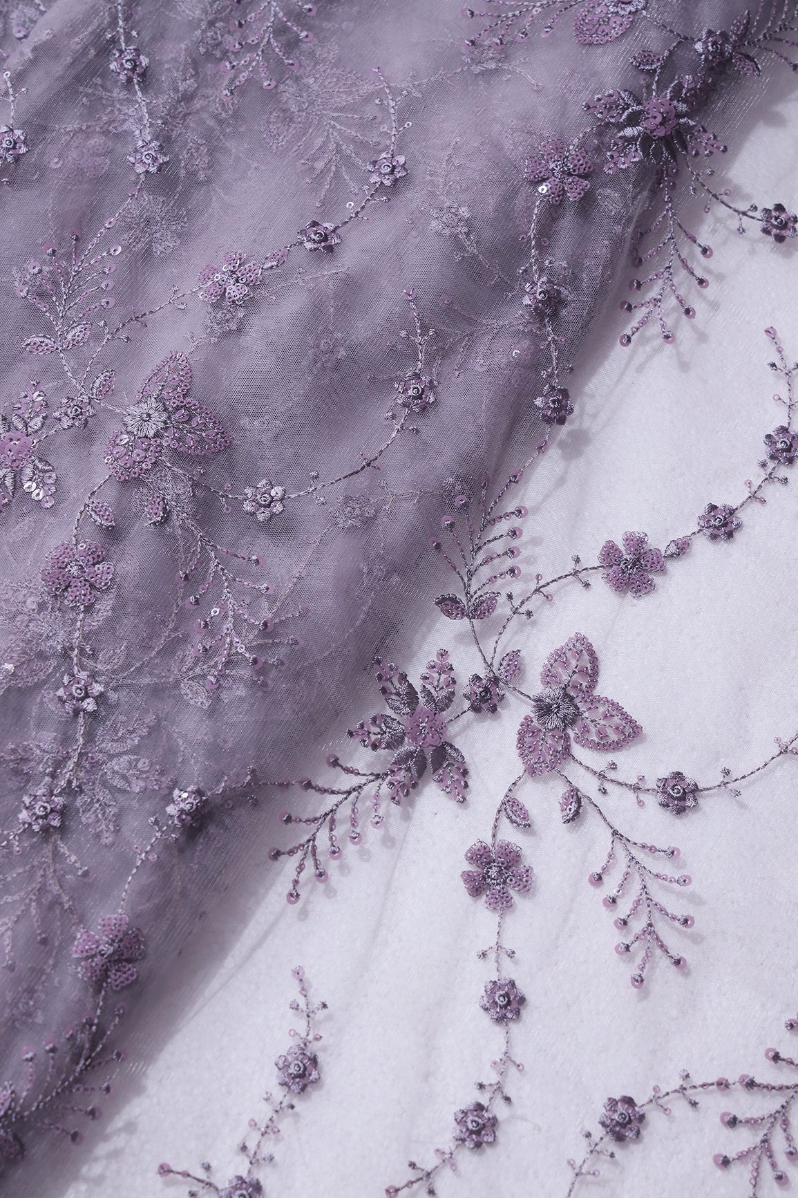 AIzaSyBcstauz-XMPRhEY21AUzeo032pxrXB5Ug - Beautiful Grey Thread With Sequins Floral Embroidery Work On Purple Grey Soft Net Fabric