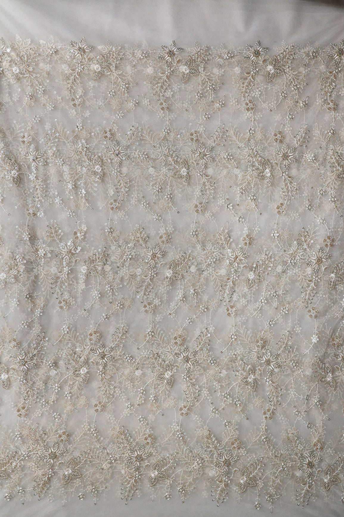 AIzaSyBcstauz-XMPRhEY21AUzeo032pxrXB5Ug - Beautiful White Thread With Sequins Floral Embroidery Work On White Dyeable Soft Net Fabric