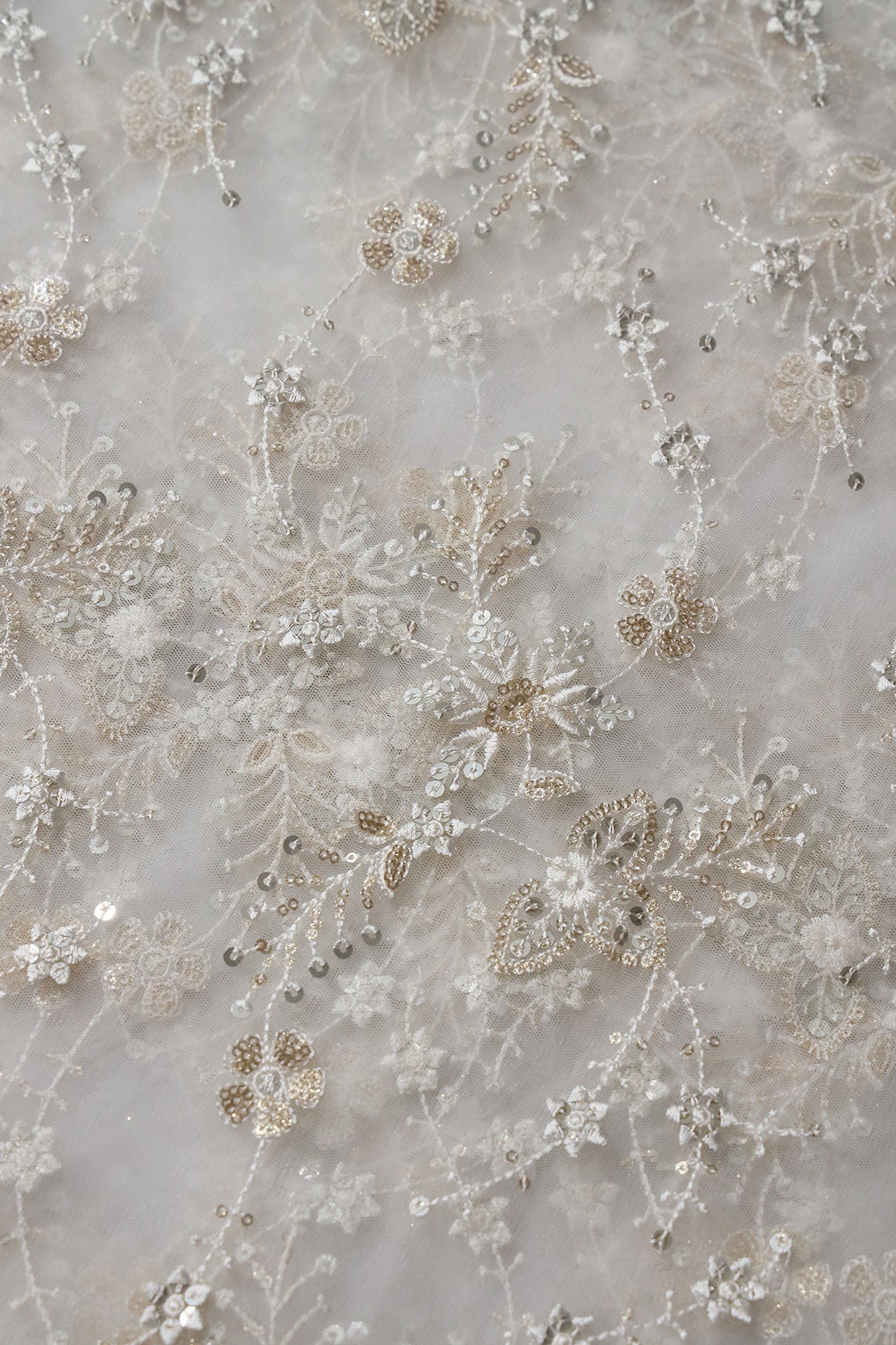 AIzaSyBcstauz-XMPRhEY21AUzeo032pxrXB5Ug - Beautiful White Thread With Sequins Floral Embroidery Work On White Dyeable Soft Net Fabric