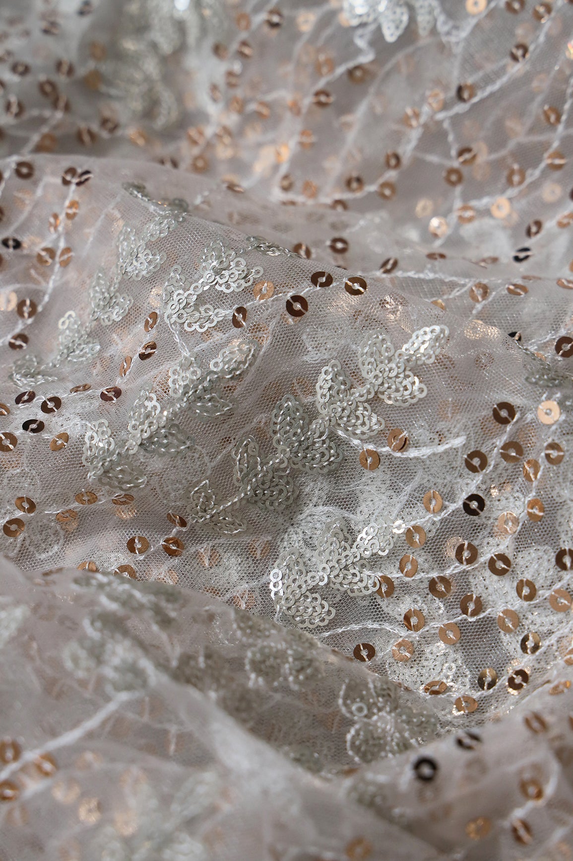 AIzaSyBcstauz-XMPRhEY21AUzeo032pxrXB5Ug - Gold And Silver Sequins Heavy Embroidery On Dyeable White Soft Net Fabric