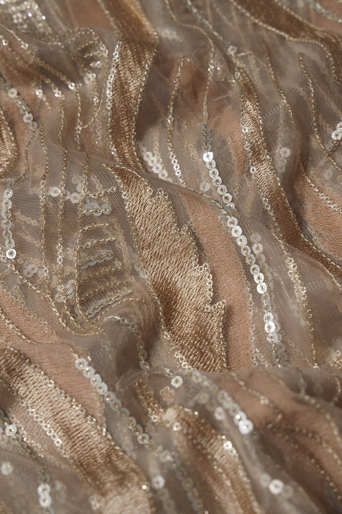 AIzaSyBcstauz-XMPRhEY21AUzeo032pxrXB5Ug - Beige Thread With Sequins Wavy Embroidery Work On Beige Soft Net Fabric