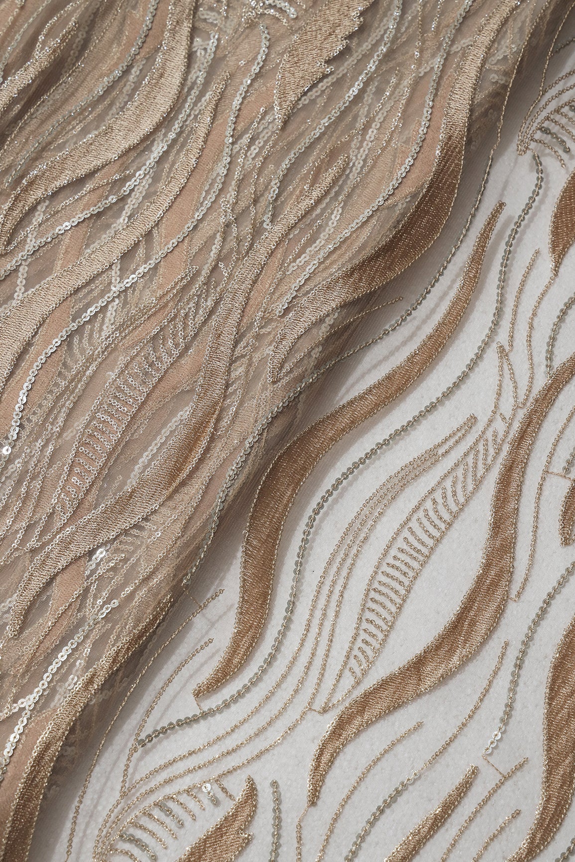 AIzaSyBcstauz-XMPRhEY21AUzeo032pxrXB5Ug - Beige Thread With Sequins Wavy Embroidery Work On Beige Soft Net Fabric