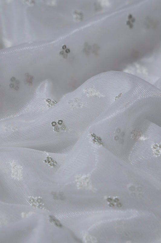 Small Motif Sequins Embroidery Work On White Dyeable Soft Net Fabric