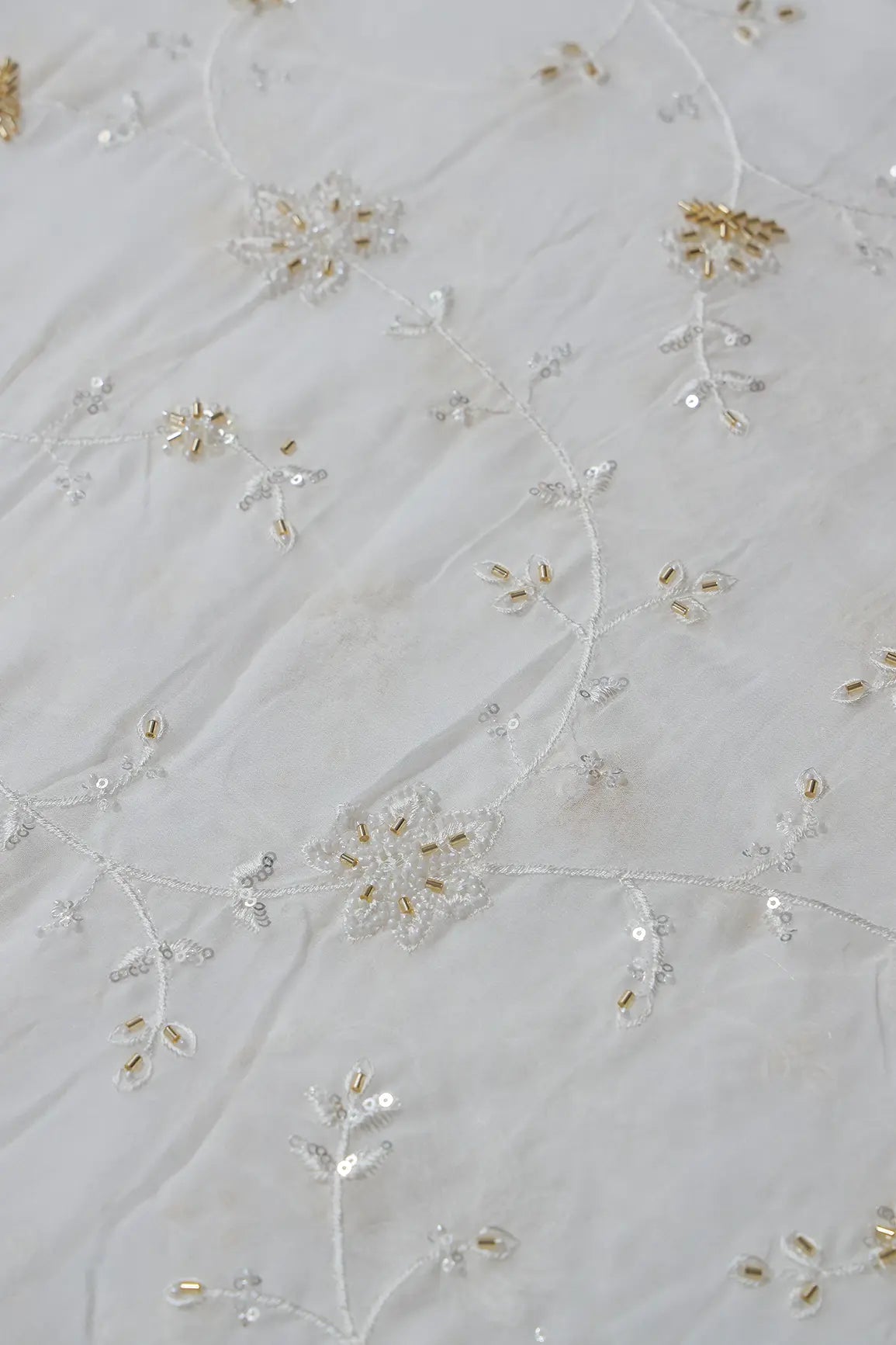 AIzaSyBcstauz-XMPRhEY21AUzeo032pxrXB5Ug - Beautiful Sequins With Beads Floral Embroidery On White Viscose Georgette Fabric