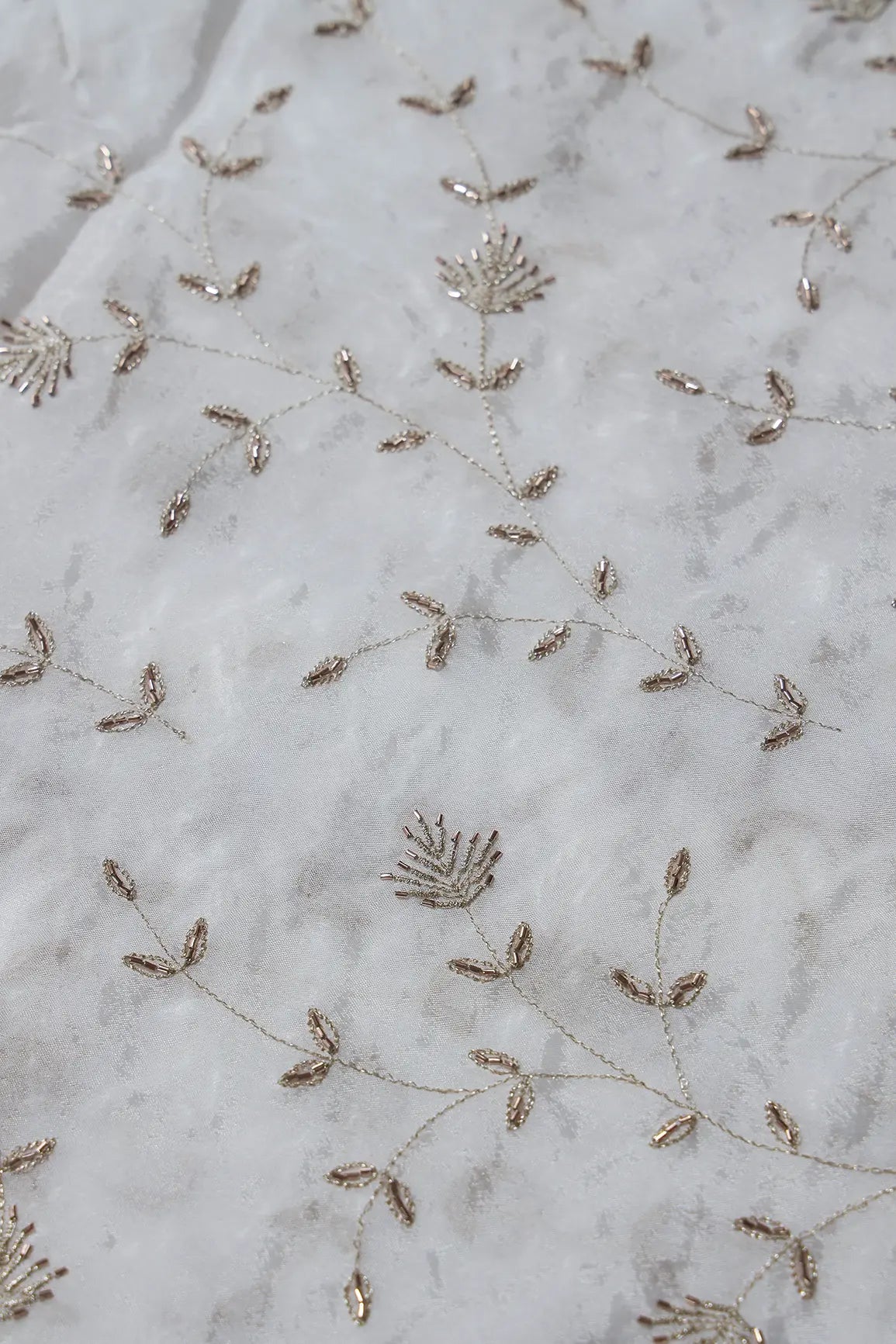 AIzaSyBcstauz-XMPRhEY21AUzeo032pxrXB5Ug - Gold Zari With Beads Beautiful Leafy Embroidery Work On White Dyeable Chinnon Chiffon Fabric