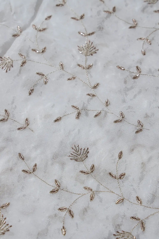 AIzaSyBcstauz-XMPRhEY21AUzeo032pxrXB5Ug - Gold Zari With Beads Beautiful Leafy Embroidery Work On White Dyeable Chinnon Chiffon Fabric