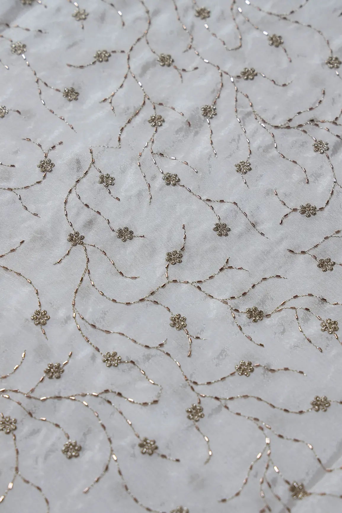AIzaSyBcstauz-XMPRhEY21AUzeo032pxrXB5Ug - Gold Zari With Beads Floral Leafy Embroidery Work On White Dyeable Chinnon Chiffon Fabric