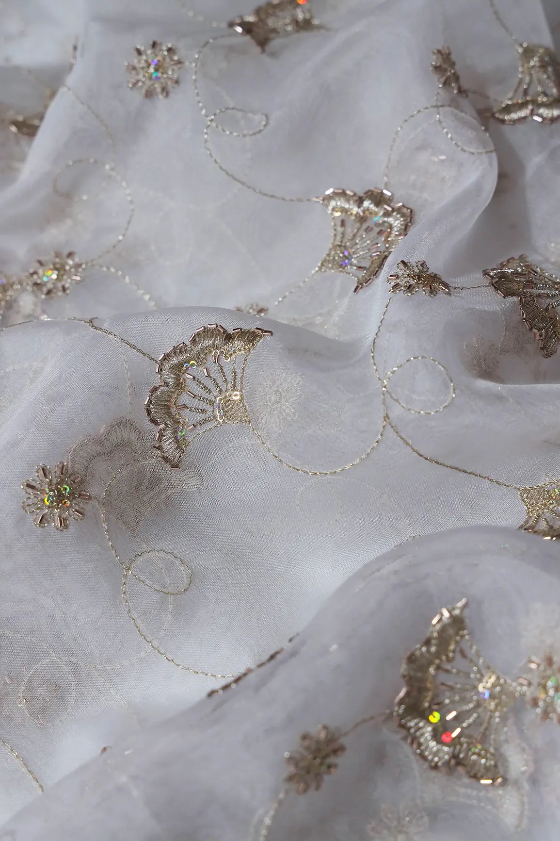 AIzaSyBcstauz-XMPRhEY21AUzeo032pxrXB5Ug - Gold Zari With Beads Beautiful Floral Embroidery On Dyeable White Organza Fabric