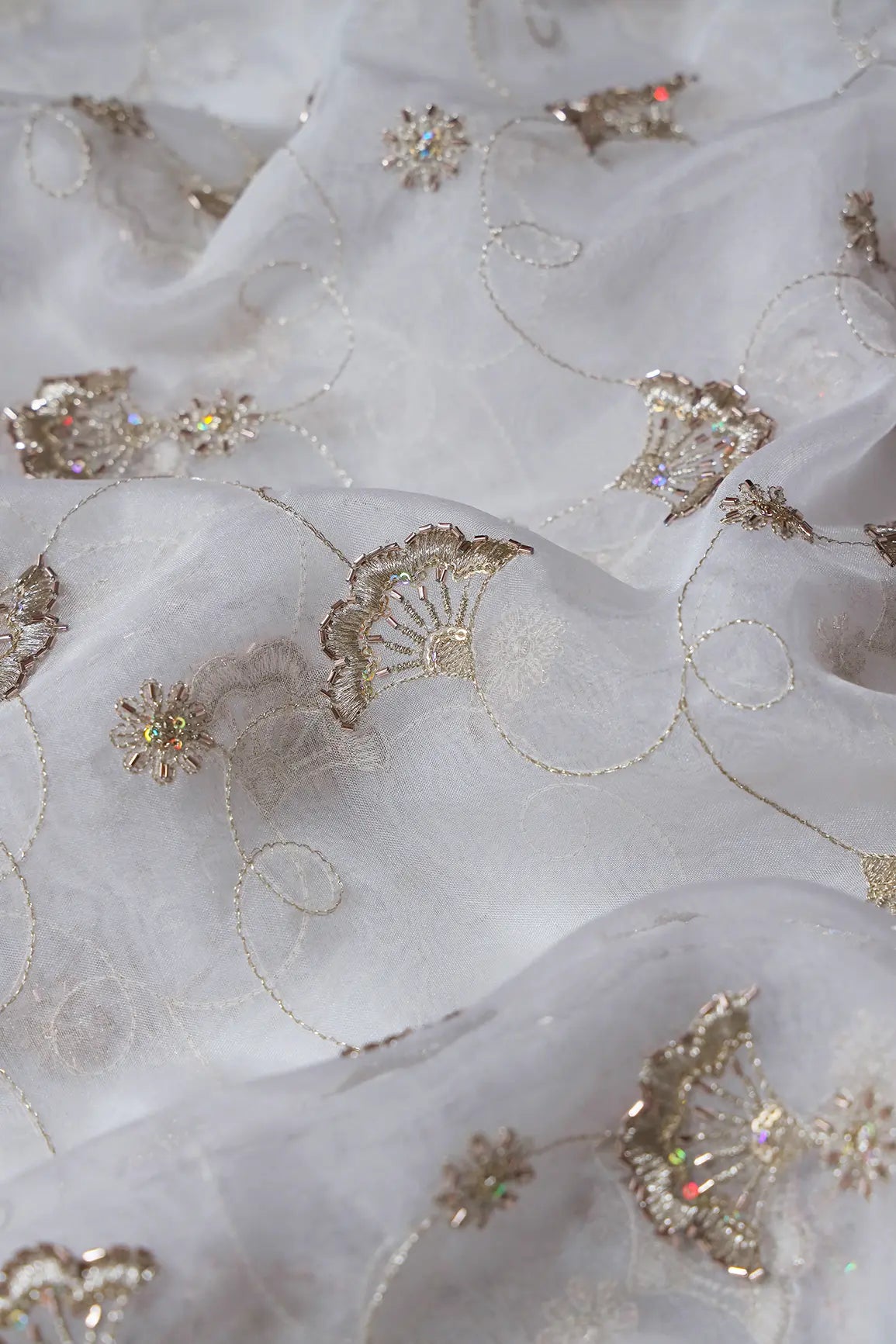 AIzaSyBcstauz-XMPRhEY21AUzeo032pxrXB5Ug - Gold Zari With Beads Beautiful Floral Embroidery On Dyeable White Organza Fabric