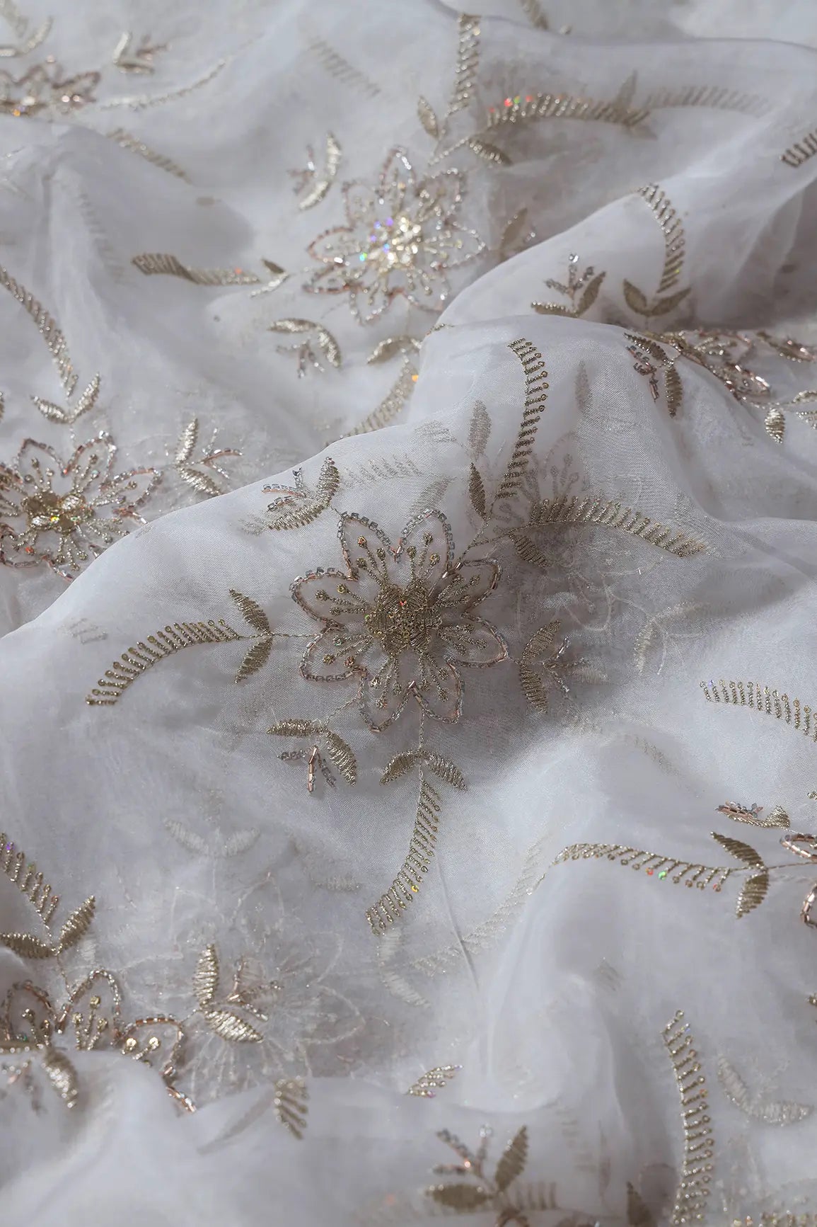 AIzaSyBcstauz-XMPRhEY21AUzeo032pxrXB5Ug - Gold Zari With Beads Floral Embroidery On Dyeable White Organza Fabric