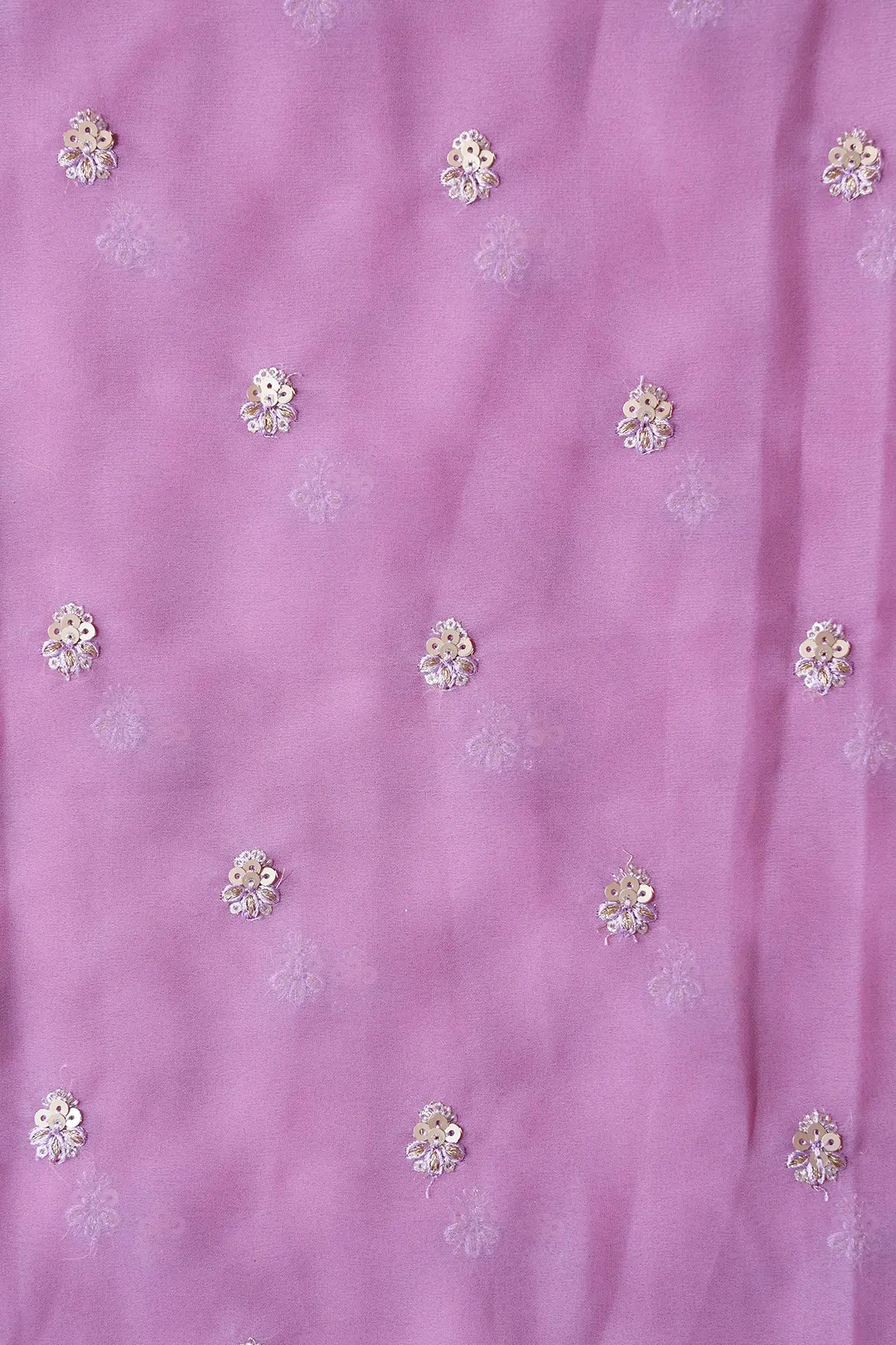 AIzaSyBcstauz-XMPRhEY21AUzeo032pxrXB5Ug - Gold Sequins With Zari Small Floral Booti Embroidery On Mauve Georgette Fabric