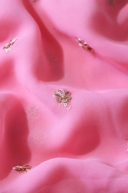 AIzaSyBcstauz-XMPRhEY21AUzeo032pxrXB5Ug - Gold Sequins With Zari Small Floral Booti Embroidery On Pink Georgette Fabric