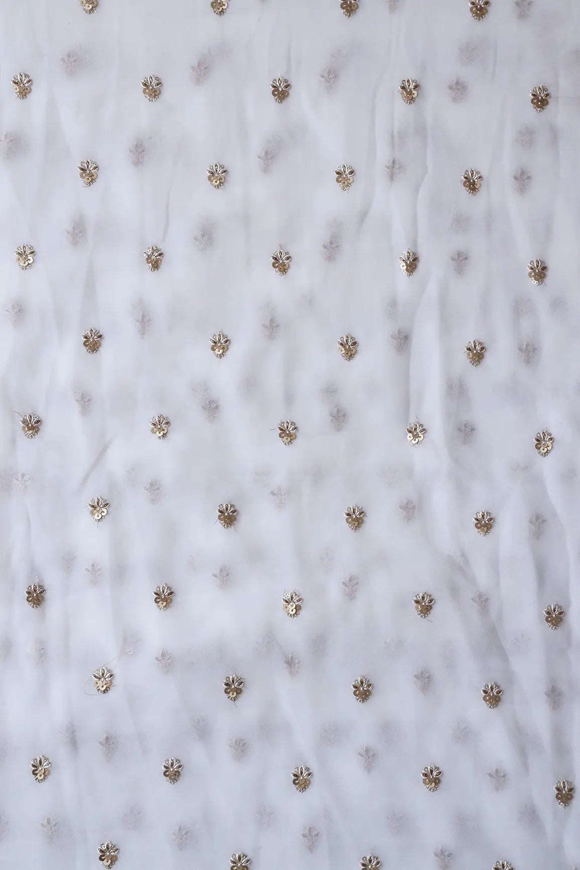 AIzaSyBcstauz-XMPRhEY21AUzeo032pxrXB5Ug - Gold Sequins With Zari Small Floral Booti Embroidery On White Georgette Fabric