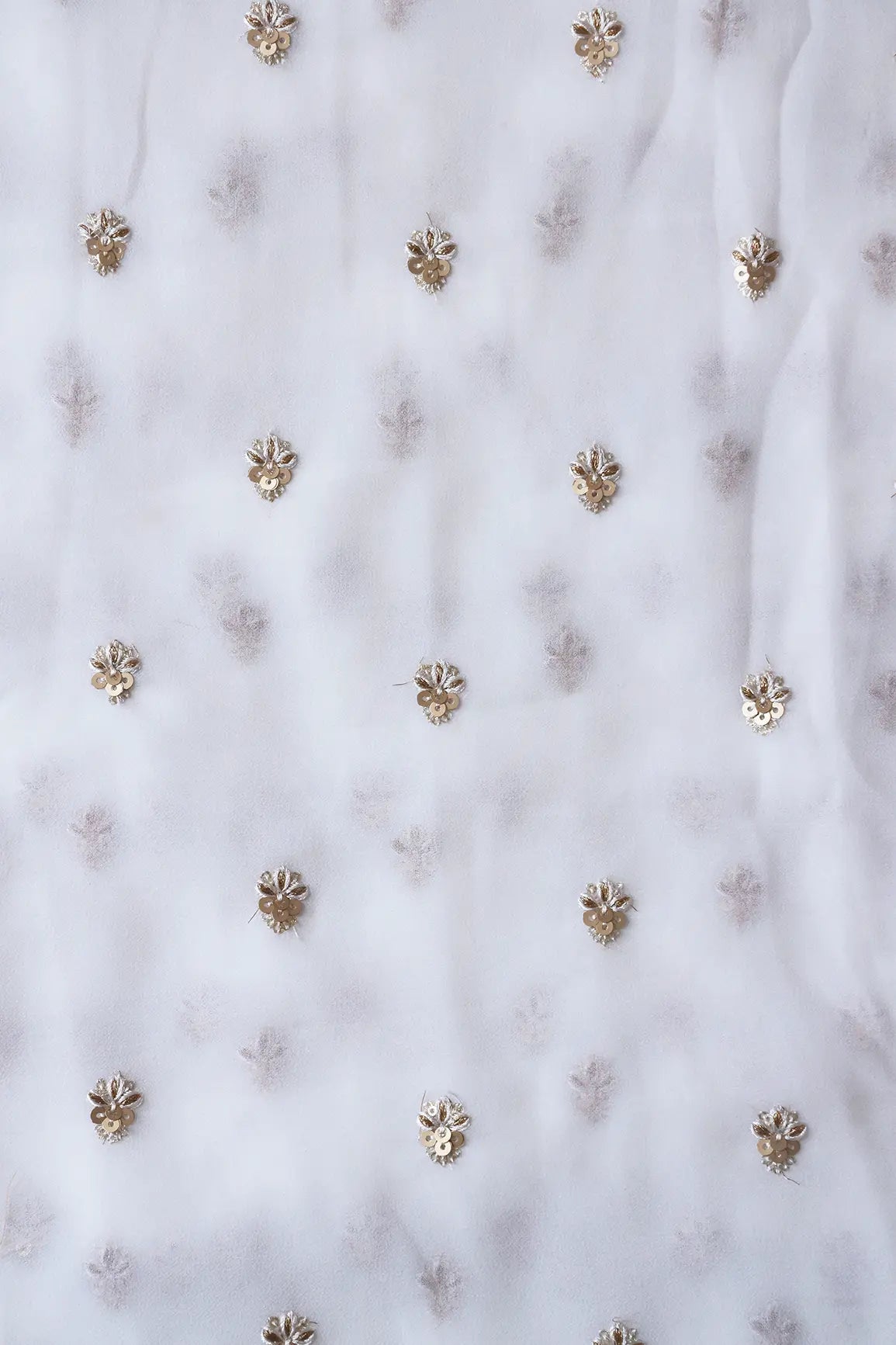 AIzaSyBcstauz-XMPRhEY21AUzeo032pxrXB5Ug - Gold Sequins With Zari Small Floral Booti Embroidery On White Georgette Fabric