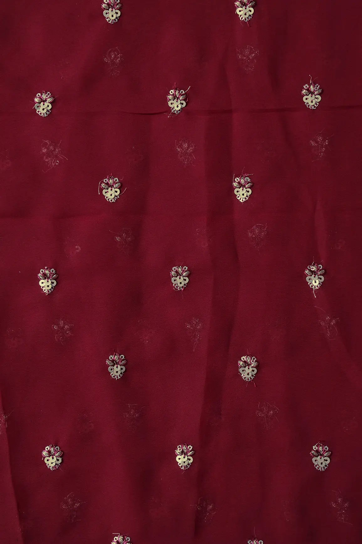 AIzaSyBcstauz-XMPRhEY21AUzeo032pxrXB5Ug - Gold Sequins With Zari Small Floral Booti Embroidery On Maroon Georgette Fabric