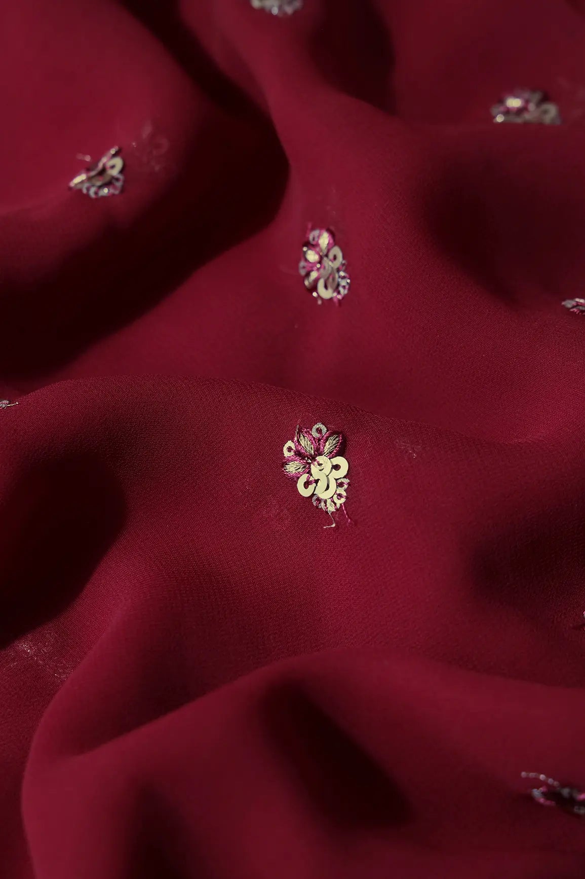 AIzaSyBcstauz-XMPRhEY21AUzeo032pxrXB5Ug - Gold Sequins With Zari Small Floral Booti Embroidery On Maroon Georgette Fabric