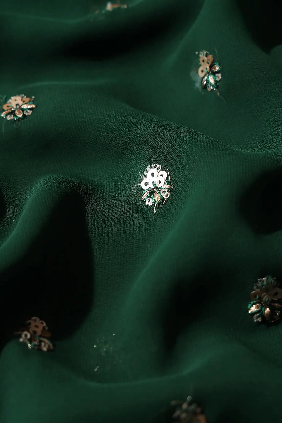 AIzaSyBcstauz-XMPRhEY21AUzeo032pxrXB5Ug - Gold Sequins With Zari Small Floral Booti Embroidery On Bottle Green Georgette Fabric