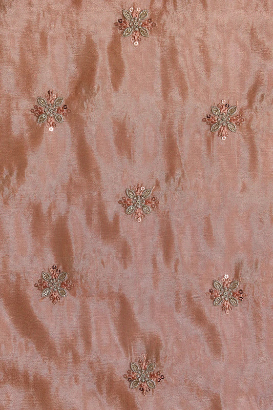 AIzaSyBcstauz-XMPRhEY21AUzeo032pxrXB5Ug - Gold Sequins And Zari Floral Booti Embroidery Work On Peach Pure Viscose Zari Tissue Fabric