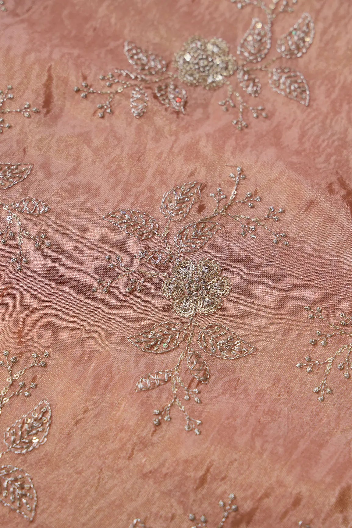 AIzaSyBcstauz-XMPRhEY21AUzeo032pxrXB5Ug - Gold Sequins And Zari Floral Embroidery Work On Peach Pure Viscose Zari Tissue Fabric