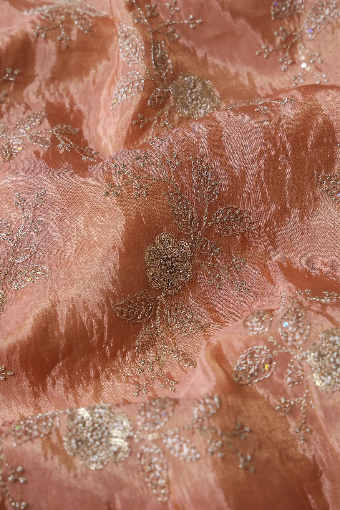 AIzaSyBcstauz-XMPRhEY21AUzeo032pxrXB5Ug - Gold Sequins And Zari Floral Embroidery Work On Peach Pure Viscose Zari Tissue Fabric