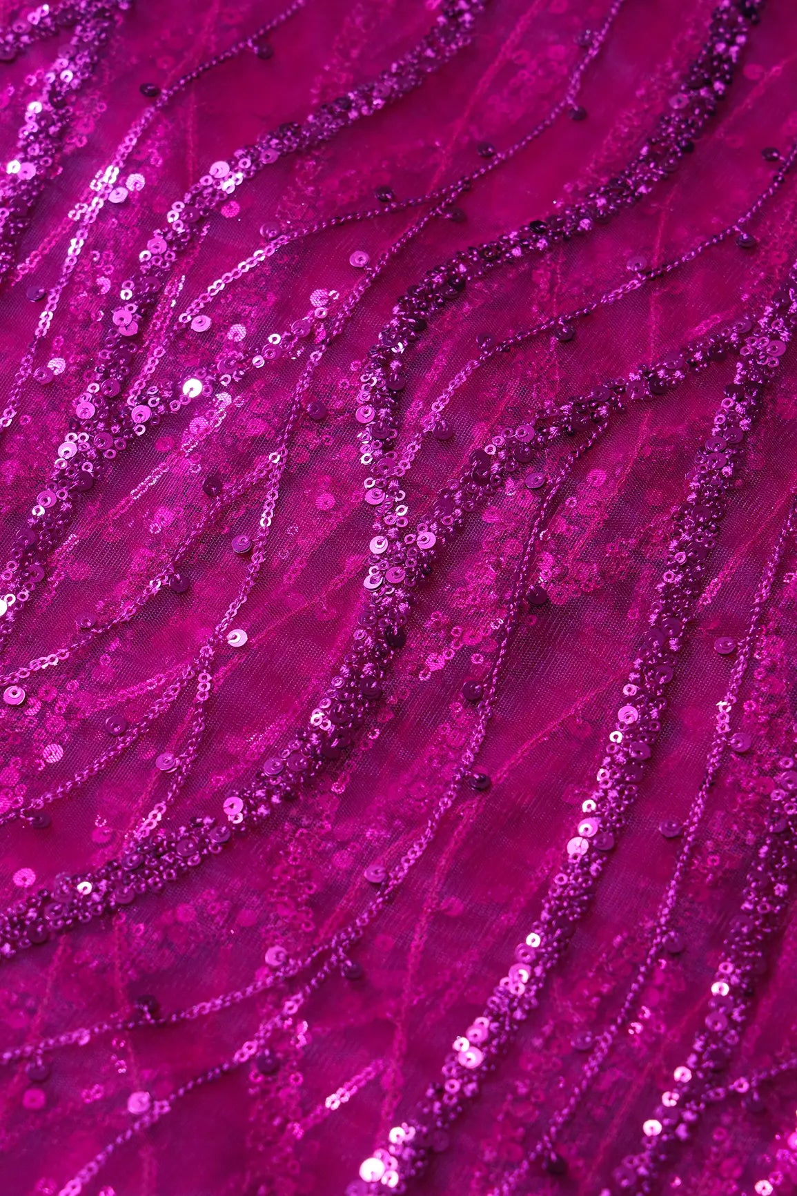 AIzaSyBcstauz-XMPRhEY21AUzeo032pxrXB5Ug - Beautiful Sequins With Fuchsia Thread Wavy Embroidery Work On Fuchsia Soft Net Fabric