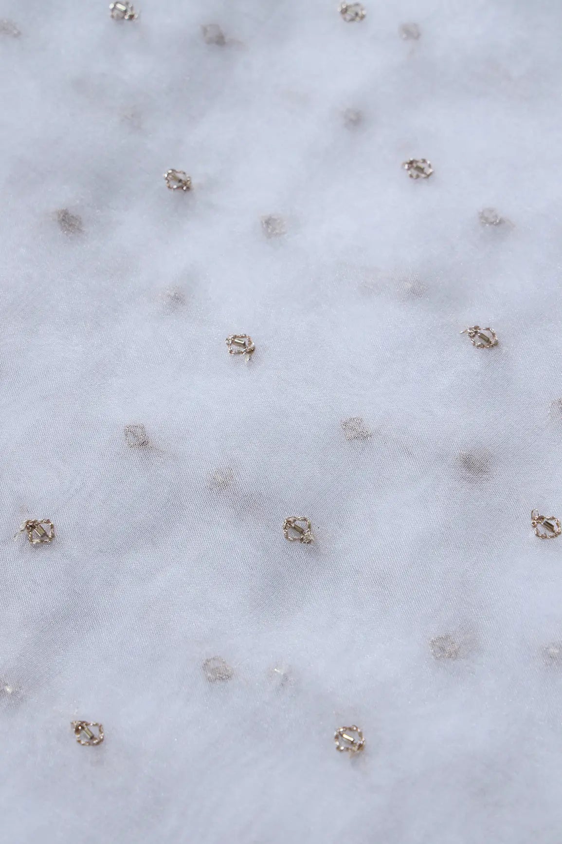 AIzaSyBcstauz-XMPRhEY21AUzeo032pxrXB5Ug - Cut Dana Beads With Zari Small Motif Embroidery On White Dyeable Organza Fabric