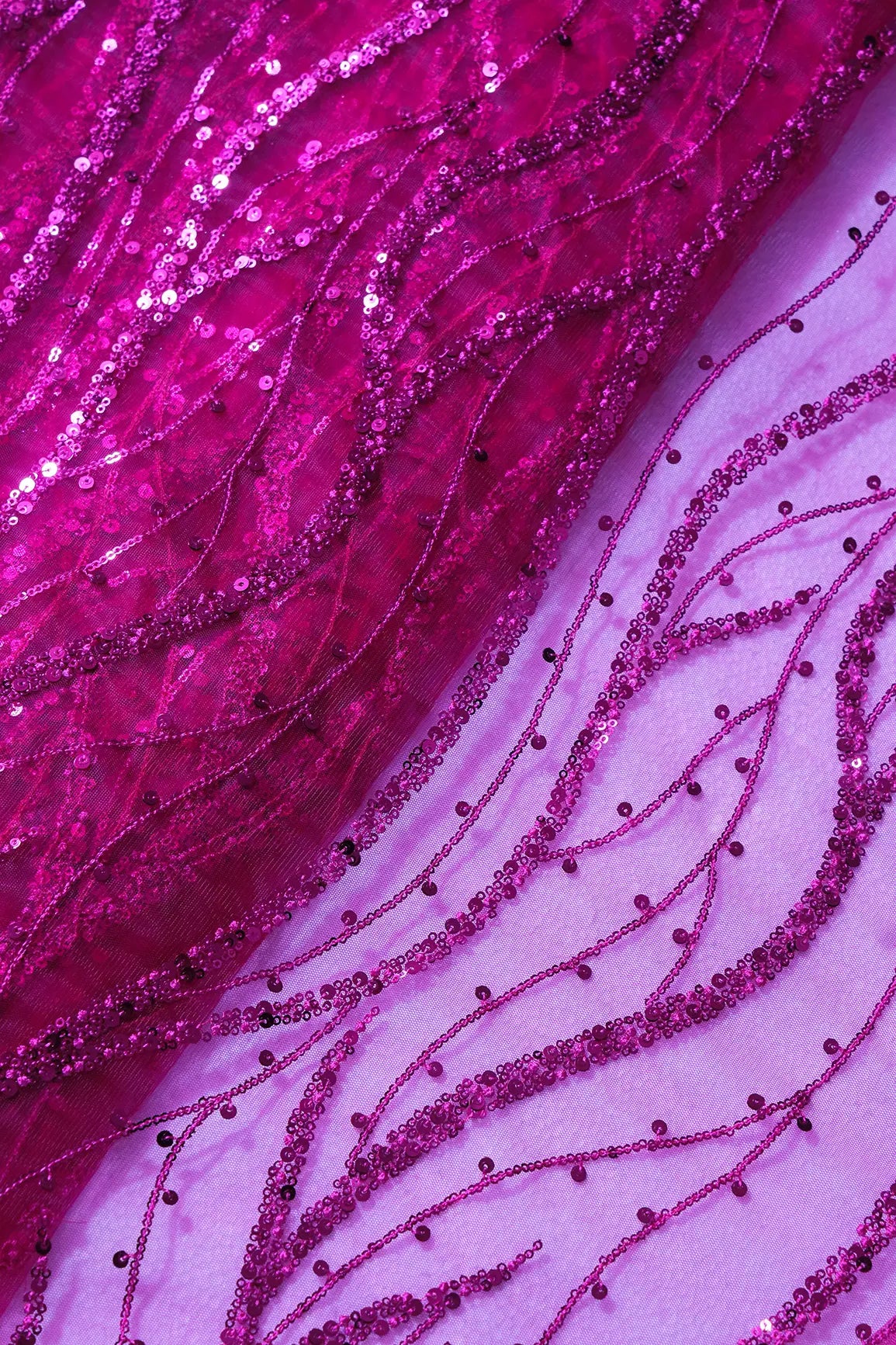 AIzaSyBcstauz-XMPRhEY21AUzeo032pxrXB5Ug - Beautiful Sequins With Fuchsia Thread Wavy Embroidery Work On Fuchsia Soft Net Fabric