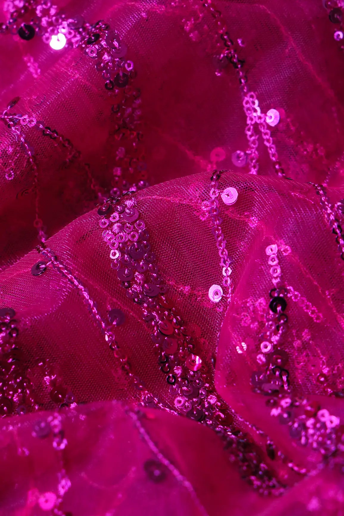 AIzaSyBcstauz-XMPRhEY21AUzeo032pxrXB5Ug - Beautiful Sequins With Fuchsia Thread Wavy Embroidery Work On Fuchsia Soft Net Fabric