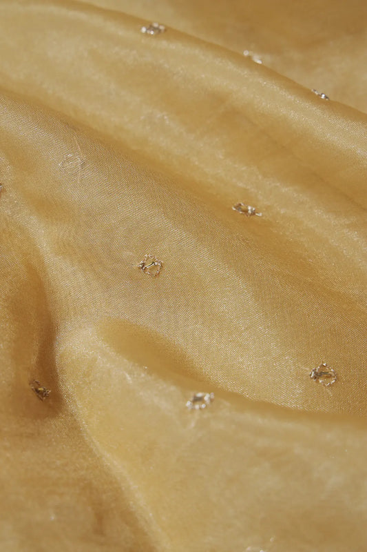 AIzaSyBcstauz-XMPRhEY21AUzeo032pxrXB5Ug - Cut Dana Beads With Zari Small Motif Embroidery On Tan Beige Organza Fabric