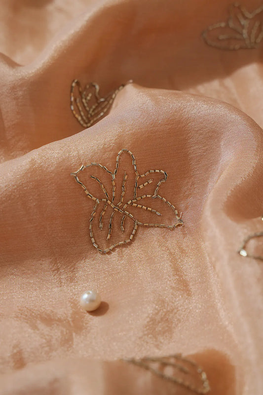 AIzaSyBcstauz-XMPRhEY21AUzeo032pxrXB5Ug - Beautiful Cut Dana Beads Floral Embroidery Work On Beige Pure Viscose Zari Tissue Fabric