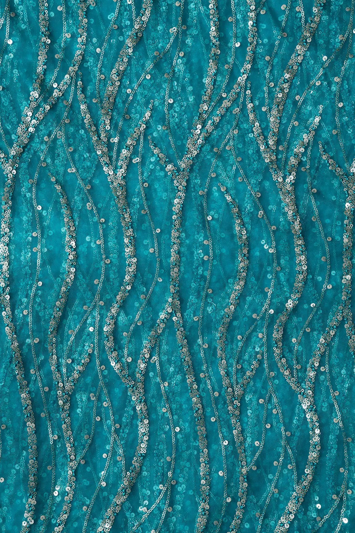 AIzaSyBcstauz-XMPRhEY21AUzeo032pxrXB5Ug - Gold And Silver Sequins With Peacock Blue Thread Wavy Embroidery On Peacock Blue Soft Net Fabric