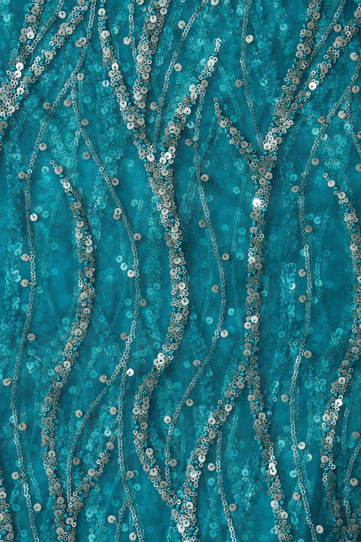 AIzaSyBcstauz-XMPRhEY21AUzeo032pxrXB5Ug - Gold And Silver Sequins With Peacock Blue Thread Wavy Embroidery On Peacock Blue Soft Net Fabric