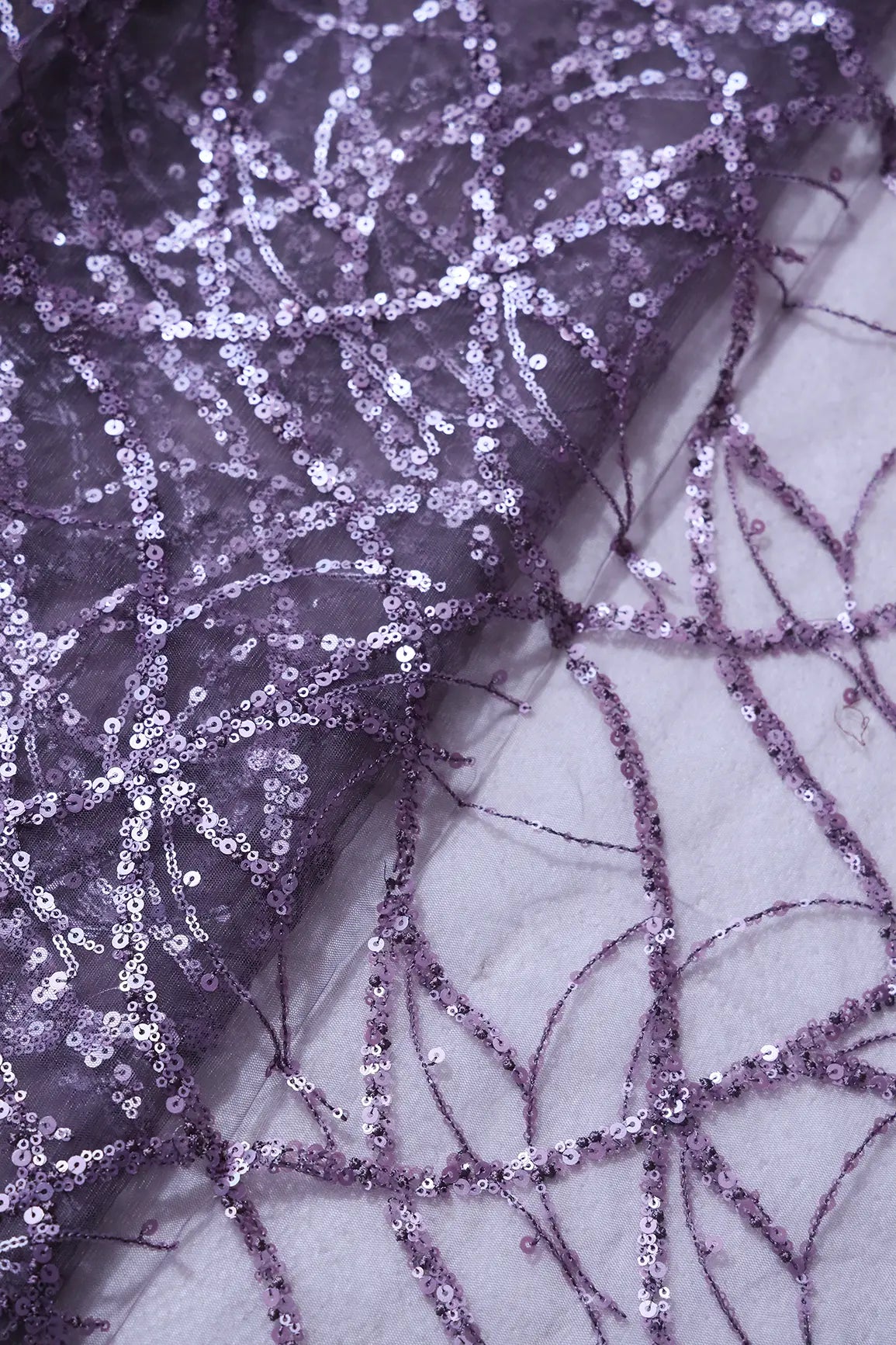 AIzaSyBcstauz-XMPRhEY21AUzeo032pxrXB5Ug - 1.50 Meter Cut Piece Of Purple Sequins Work Embroidery On Purple Grey Soft Net Fabric