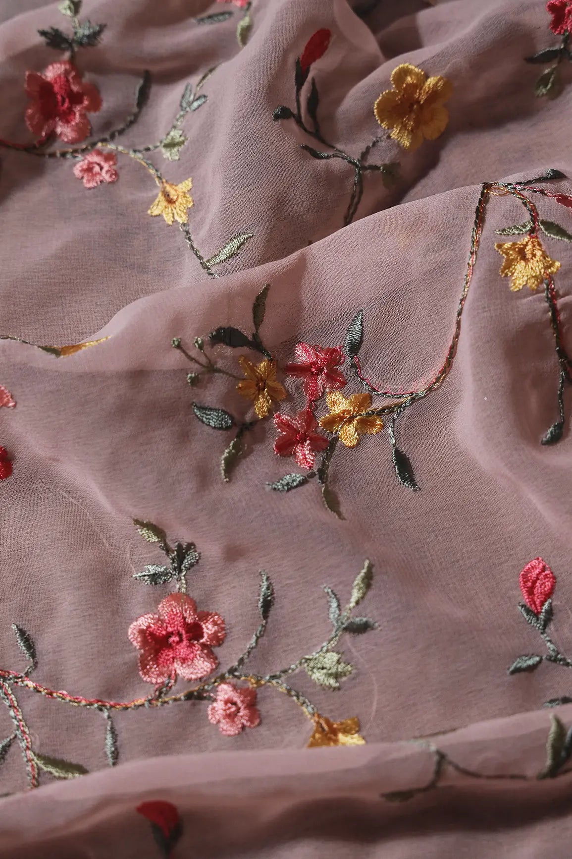 AIzaSyBcstauz-XMPRhEY21AUzeo032pxrXB5Ug - 1 Meter Cut Piece Of Multi Thread Work Floral Embroidery On Peach Georgette Fabric