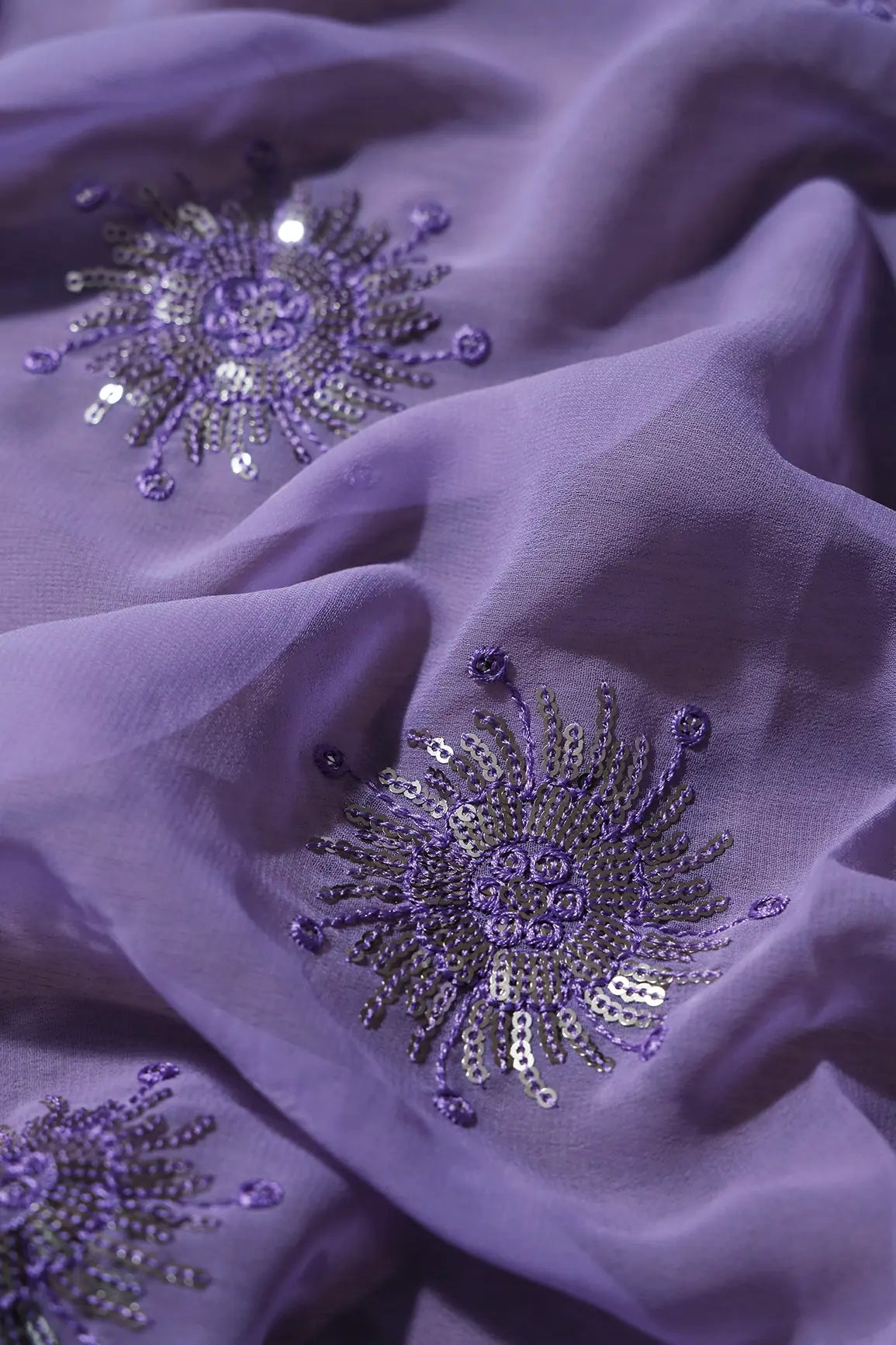 AIzaSyBcstauz-XMPRhEY21AUzeo032pxrXB5Ug - 0.90 Meter Cut Piece Of Silver Sequins With Thread Work Floral Embroidery On Lilac Georgette Fabric