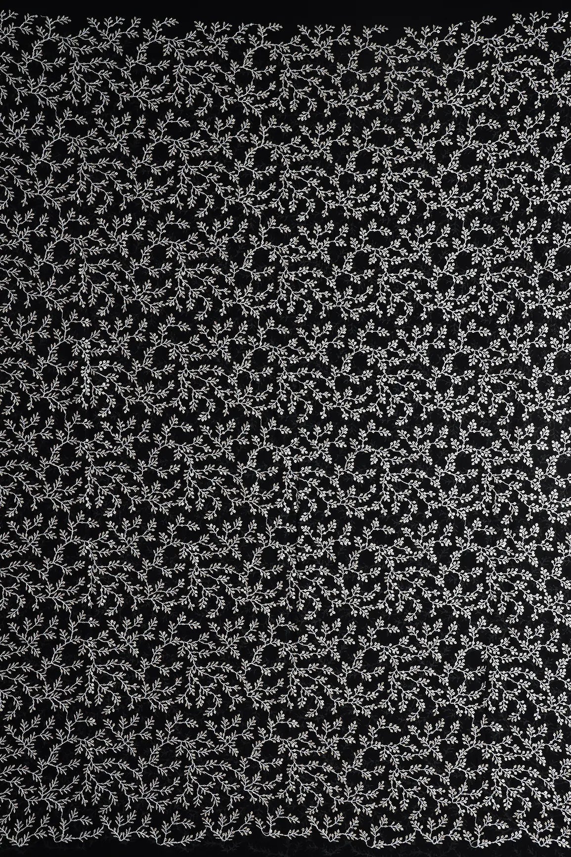 AIzaSyBcstauz-XMPRhEY21AUzeo032pxrXB5Ug - 3.90 Meter Cut Piece Of White Thread With Gold Sequins Leafy Embroidery On Black Georgette Fabric