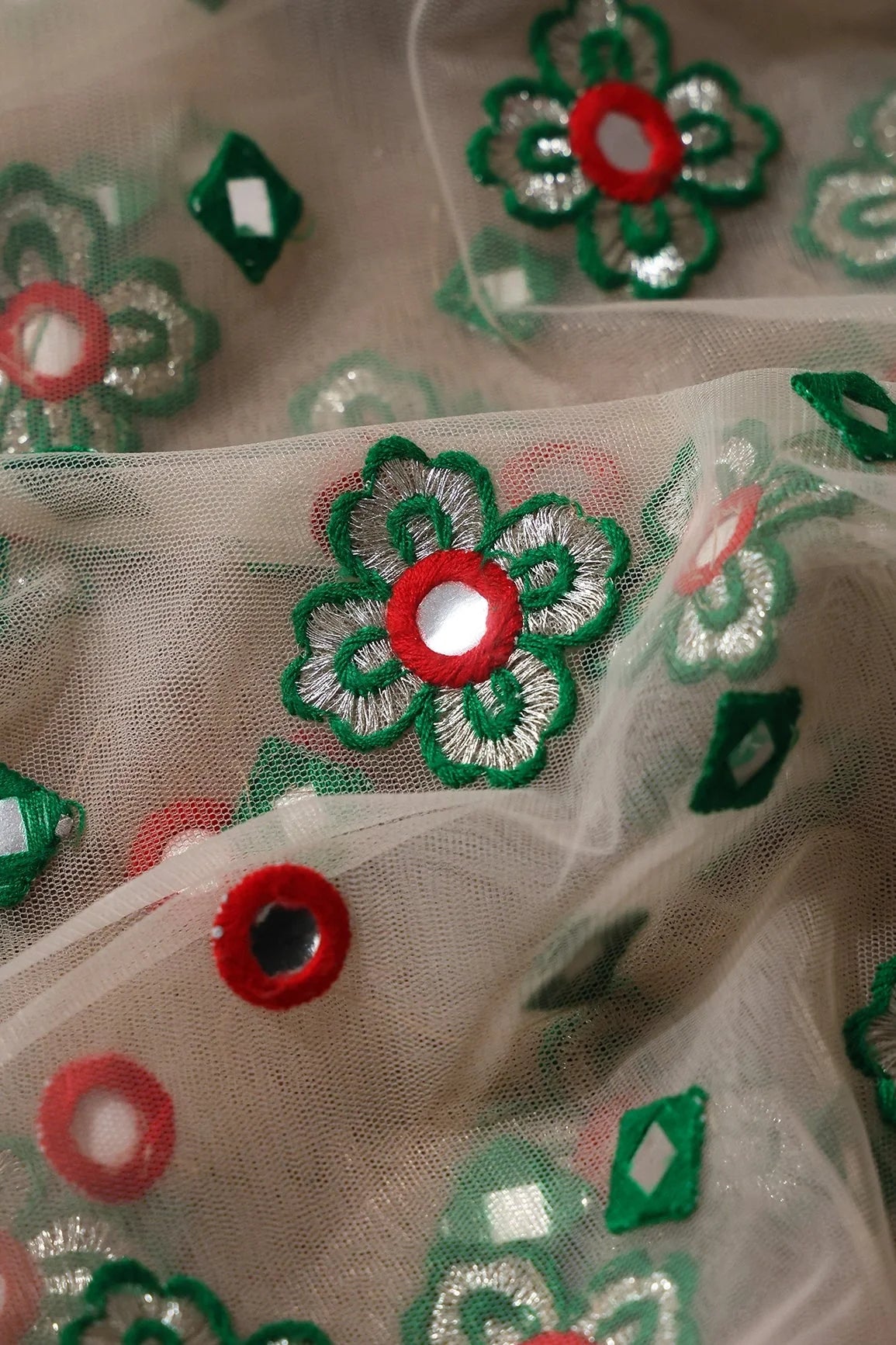 AIzaSyBcstauz-XMPRhEY21AUzeo032pxrXB5Ug - 4 Meter Cut Piece Of Red And Green Thread With Faux Mirror Traditional Embroidery On Light Beige Soft Net Fabric