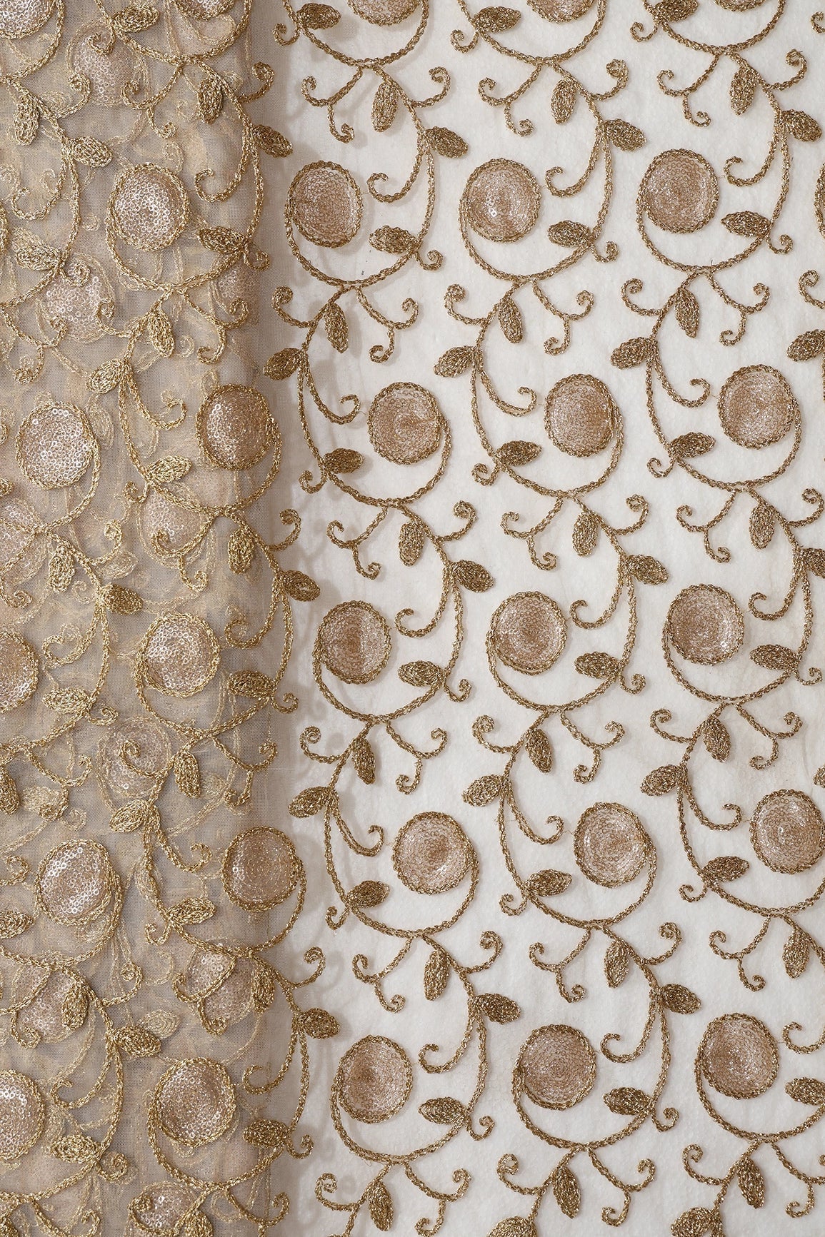 AIzaSyBcstauz-XMPRhEY21AUzeo032pxrXB5Ug - 5.75 Meter Cut Piece Of Gold Sequins With Gold Zari Leafy Embroidery On Beige Soft Net Fabric