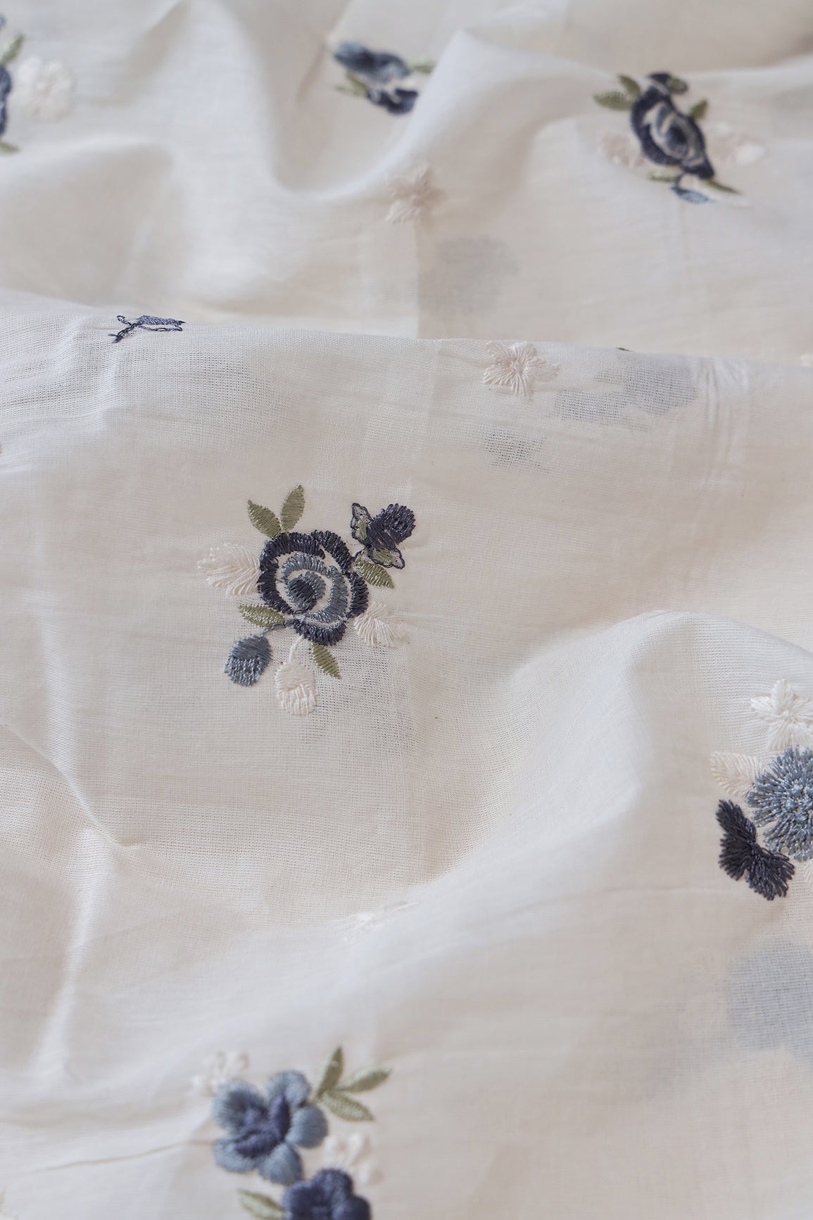 AIzaSyBcstauz-XMPRhEY21AUzeo032pxrXB5Ug - Grey And White Thread Small Floral Embroidery On Off White Organic Cotton Fabric